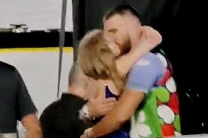 Taylor Swift and Travis Kelce share a romantic kiss as they wrap up her Singapore shows before a two-month break