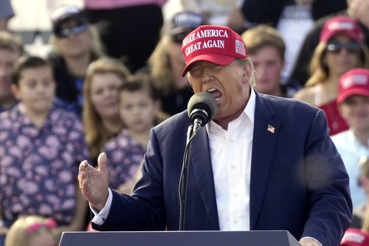 Trump speaking during a campaign 