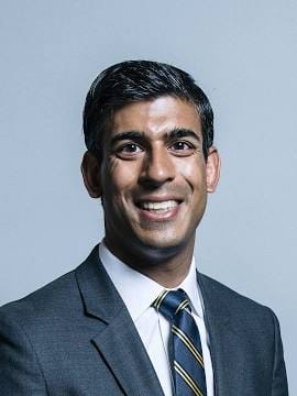 A photo of Rishi Sunak smiling 