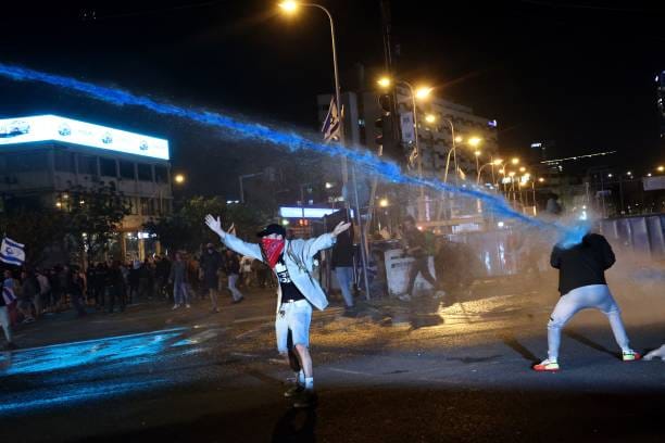 Tragedy Strikes Tel Aviv Rally: Three Injured as Car Rams into Protesters